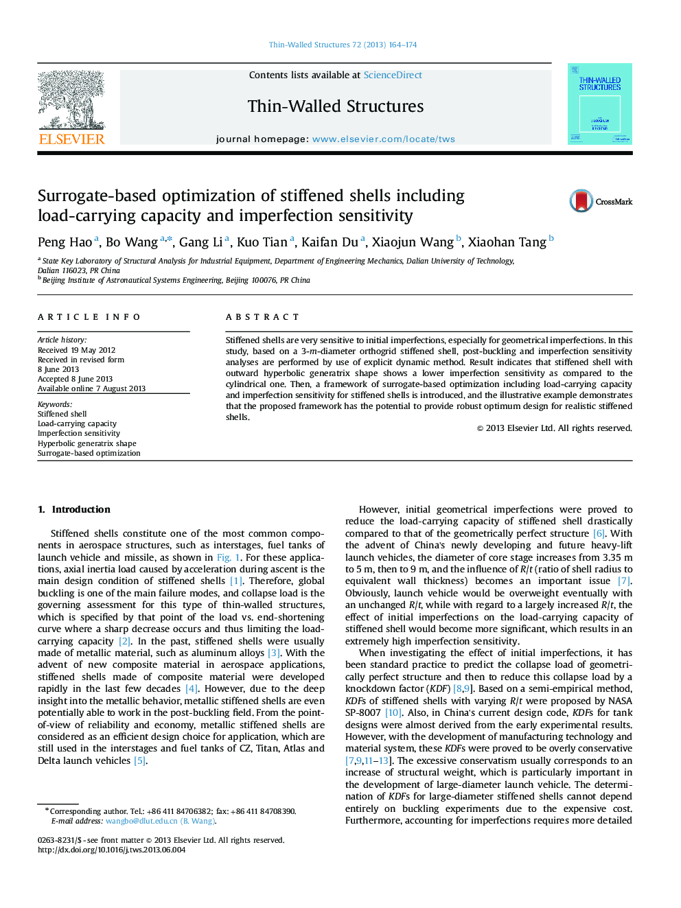 Surrogate-based optimization of stiffened shells including load-carrying capacity and imperfection sensitivity