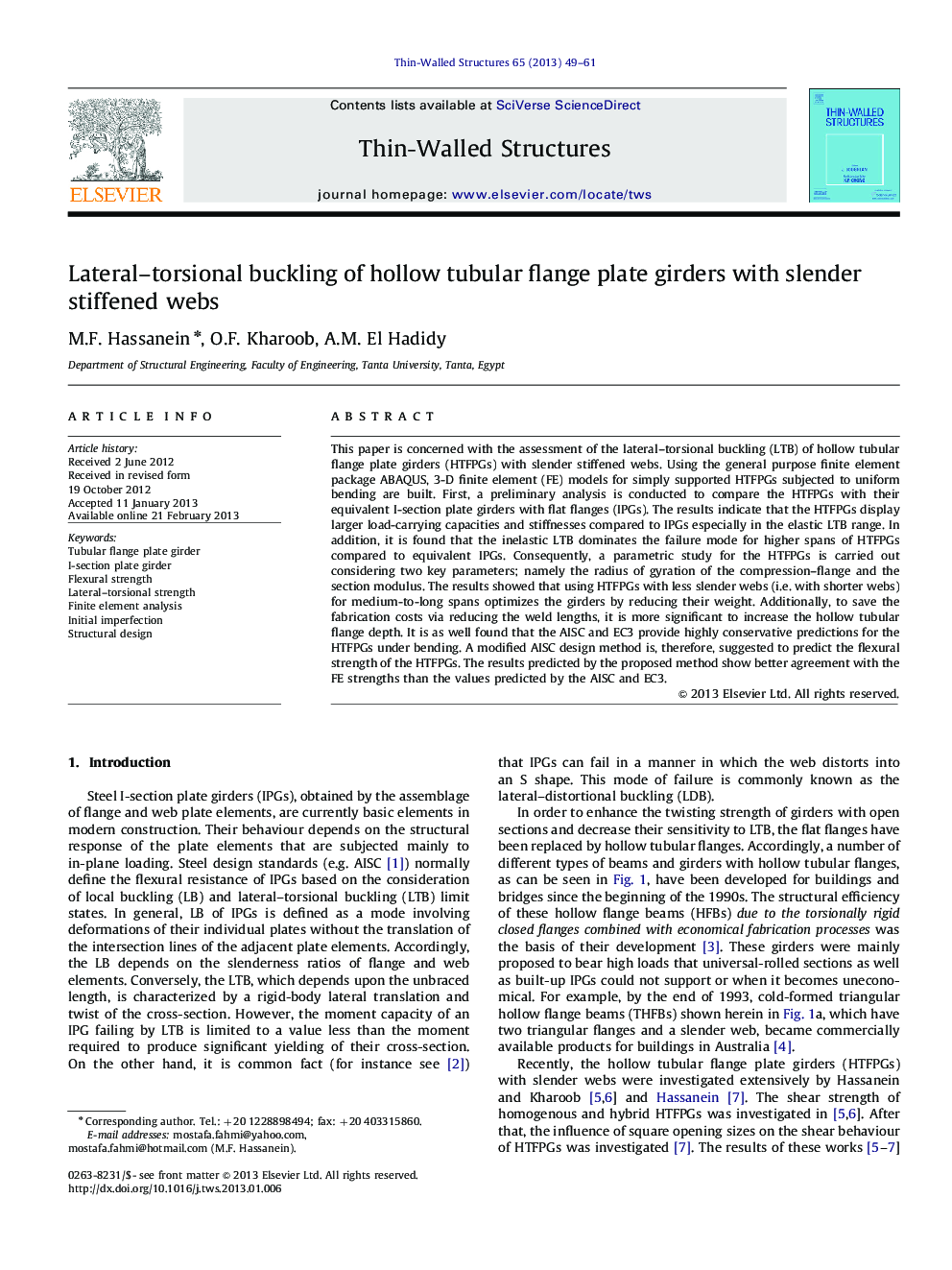 Lateral–torsional buckling of hollow tubular flange plate girders with slender stiffened webs