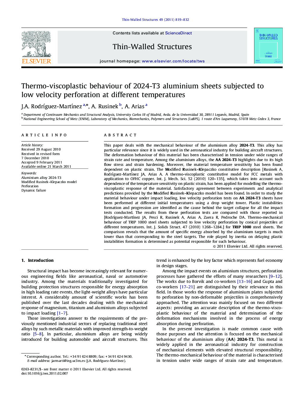 Thermo-viscoplastic behaviour of 2024-T3 aluminium sheets subjected to low velocity perforation at different temperatures