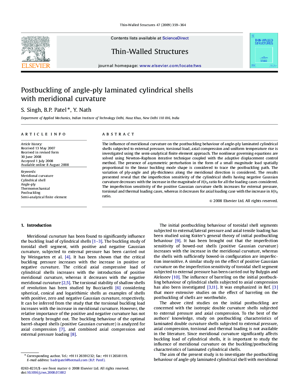 Postbuckling of angle-ply laminated cylindrical shells with meridional curvature