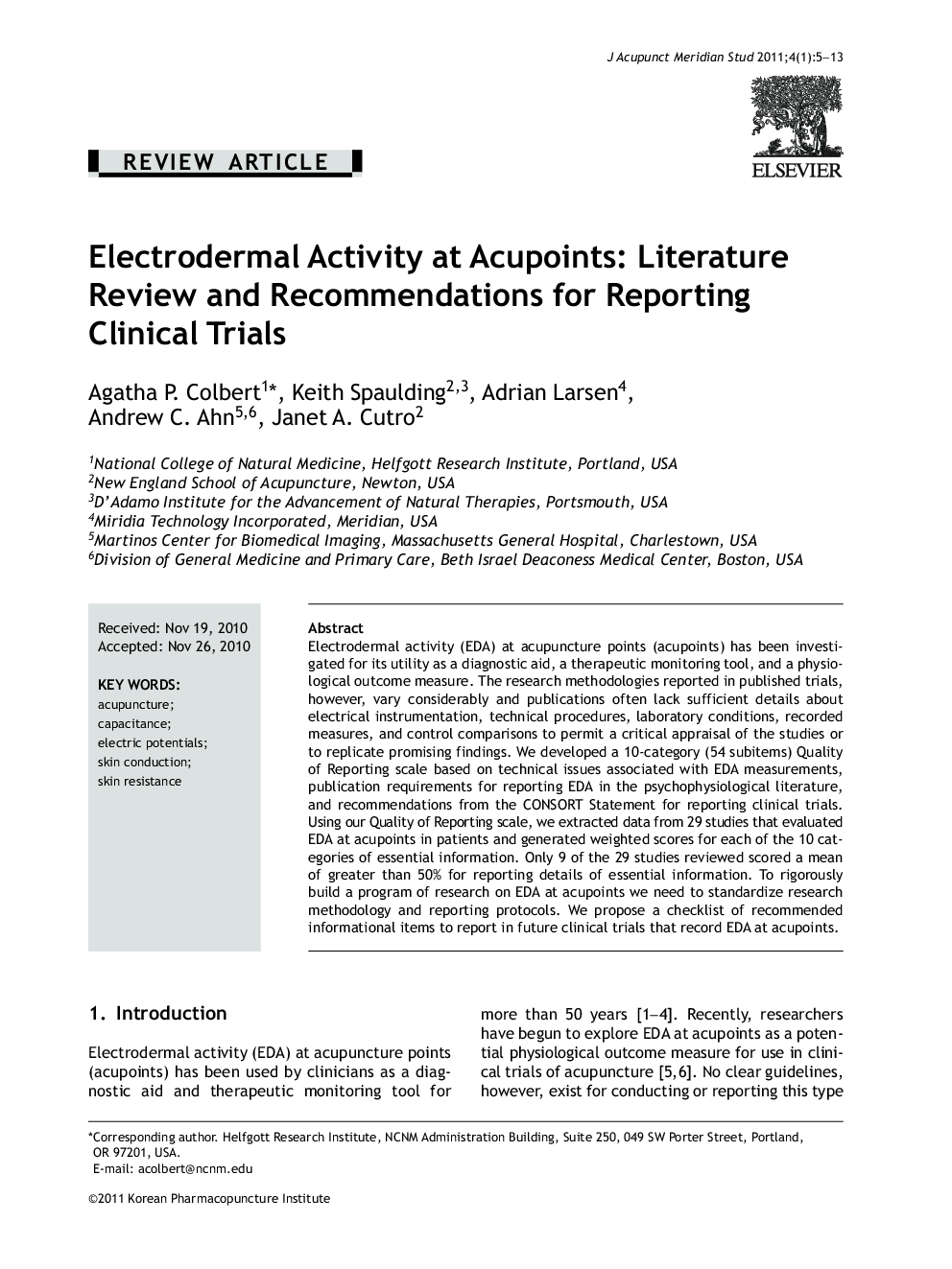 Electrodermal Activity at Acupoints: Literature Review and Recommendations for Reporting Clinical Trials