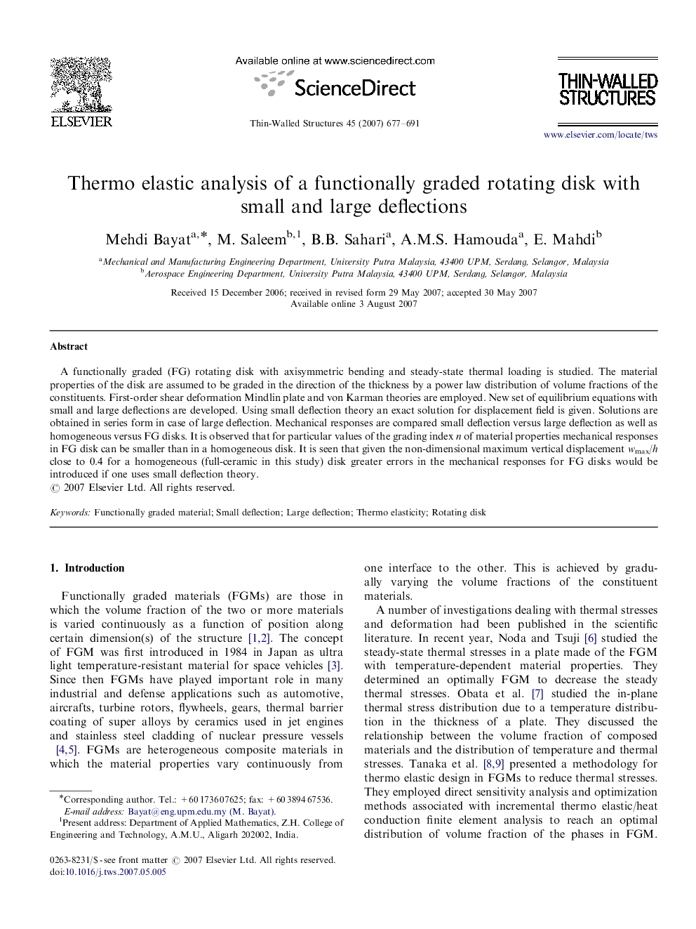 Thermo elastic analysis of a functionally graded rotating disk with small and large deflections