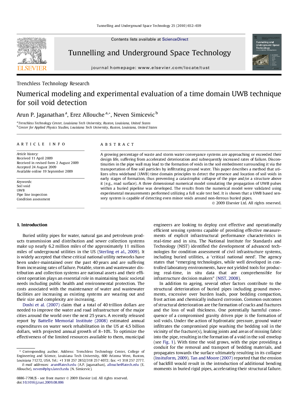 Numerical modeling and experimental evaluation of a time domain UWB technique for soil void detection