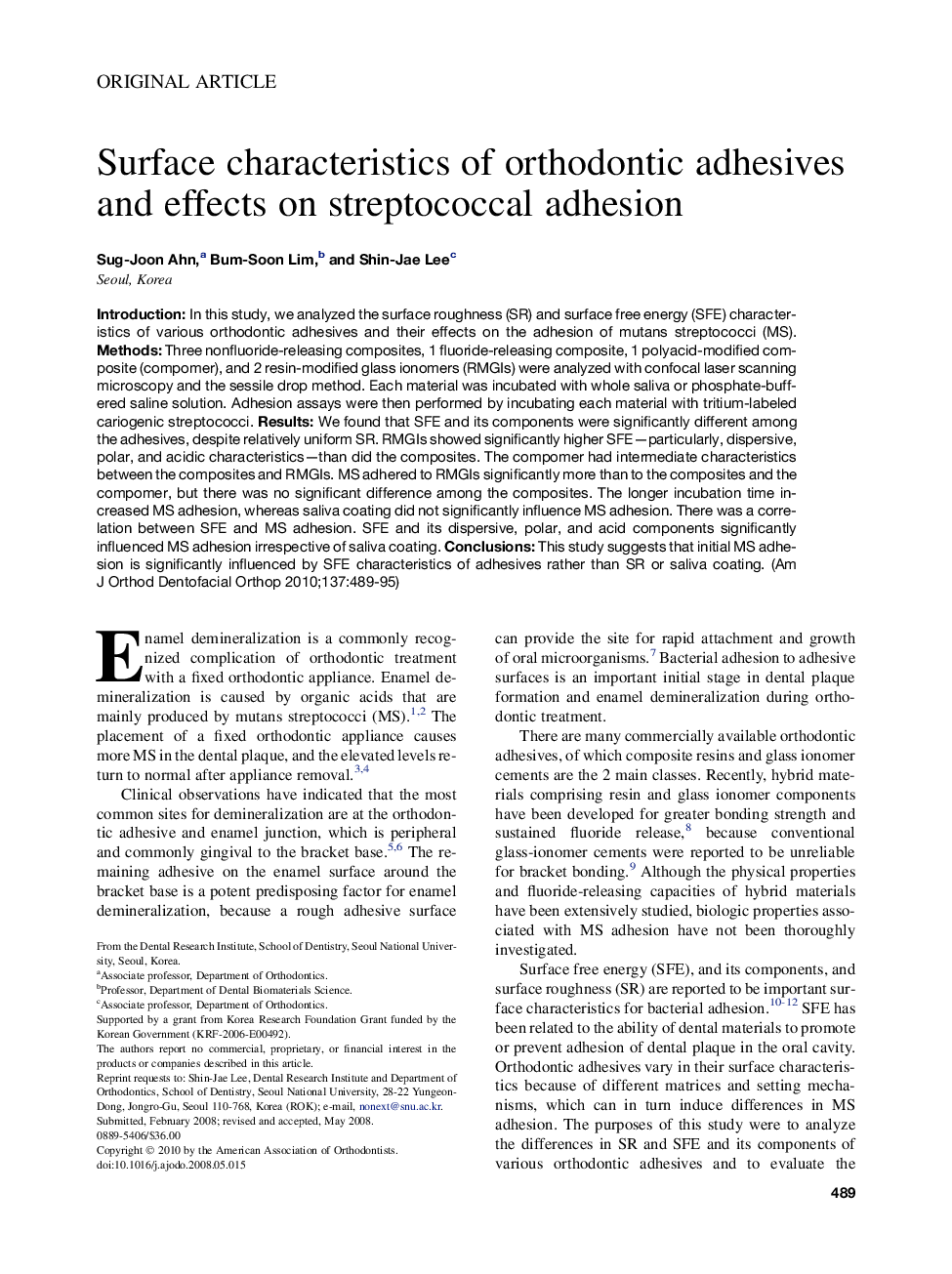 Surface characteristics of orthodontic adhesives and effects on streptococcal adhesion 