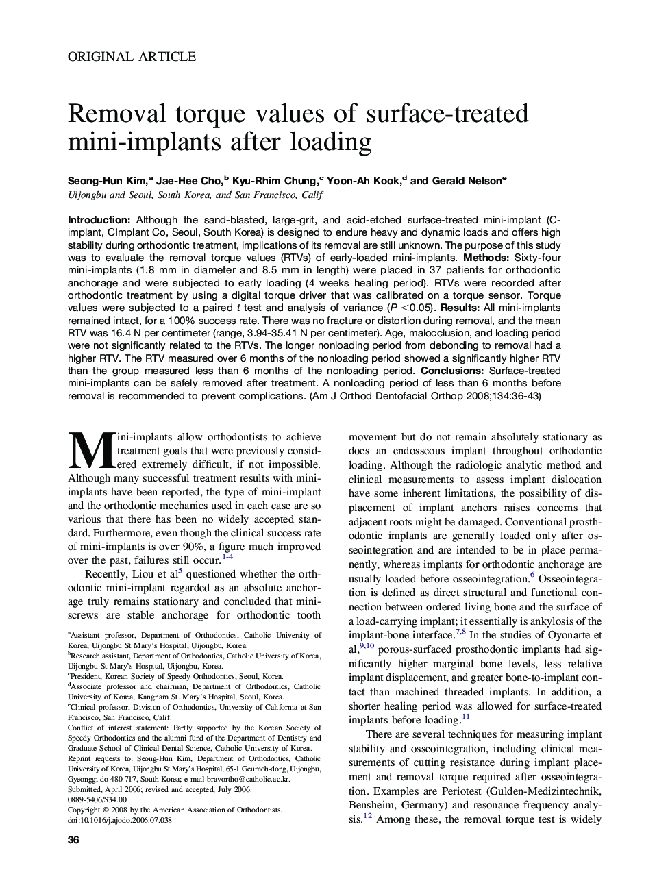 Removal torque values of surface-treated mini-implants after loading 