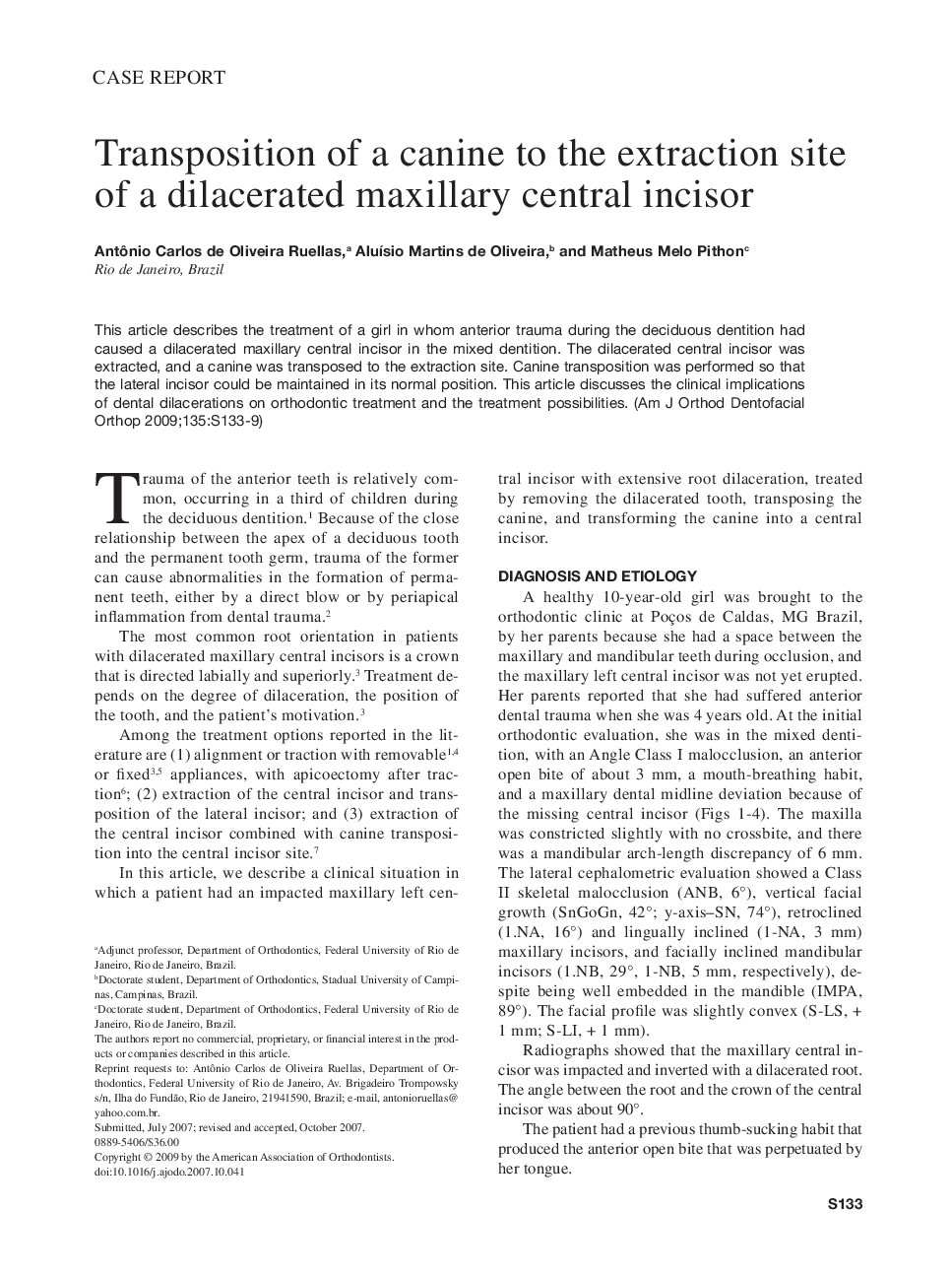 Transposition of a canine to the extraction site of a dilacerated maxillary central incisor 