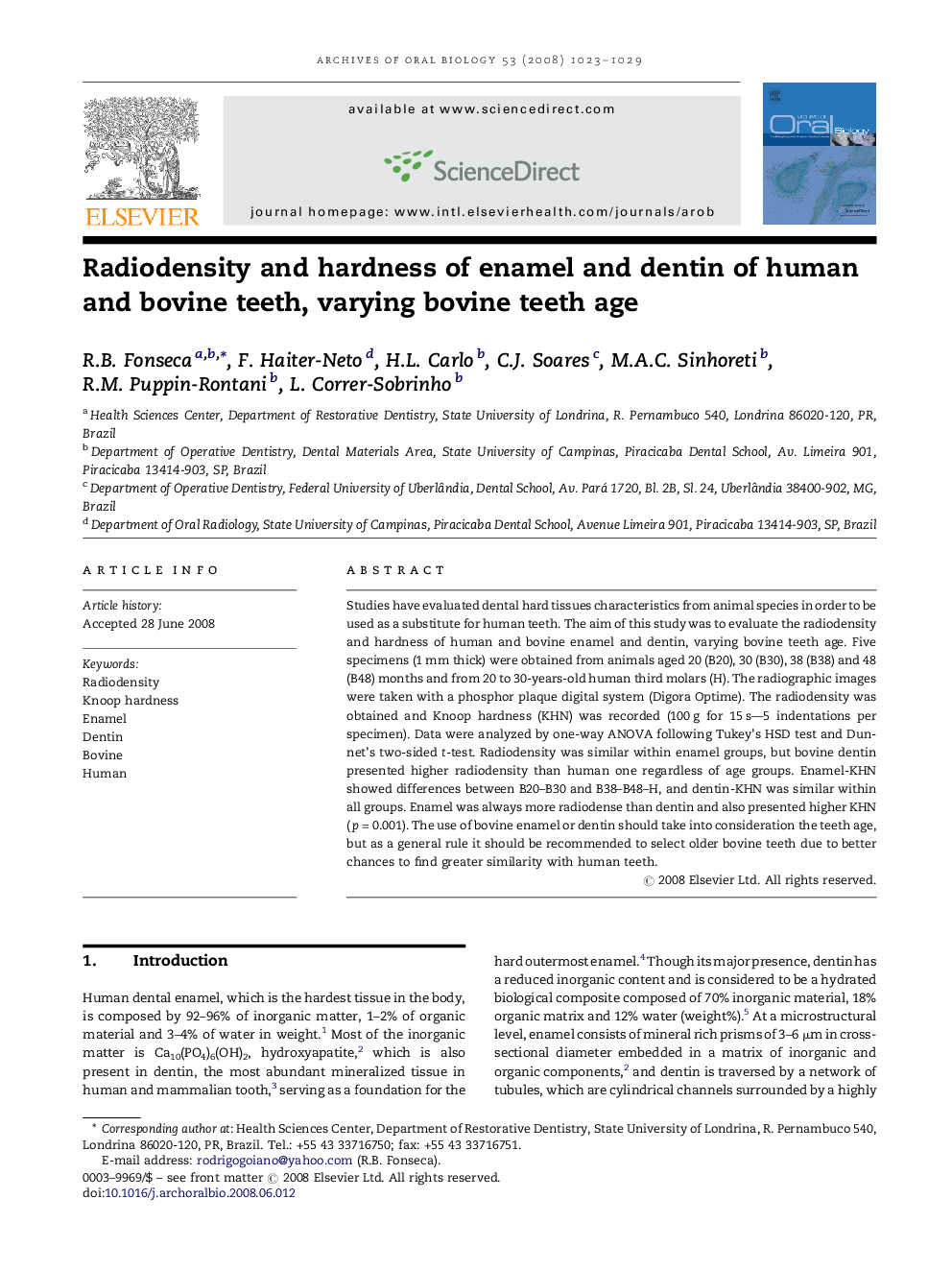 Radiodensity and hardness of enamel and dentin of human and bovine teeth, varying bovine teeth age