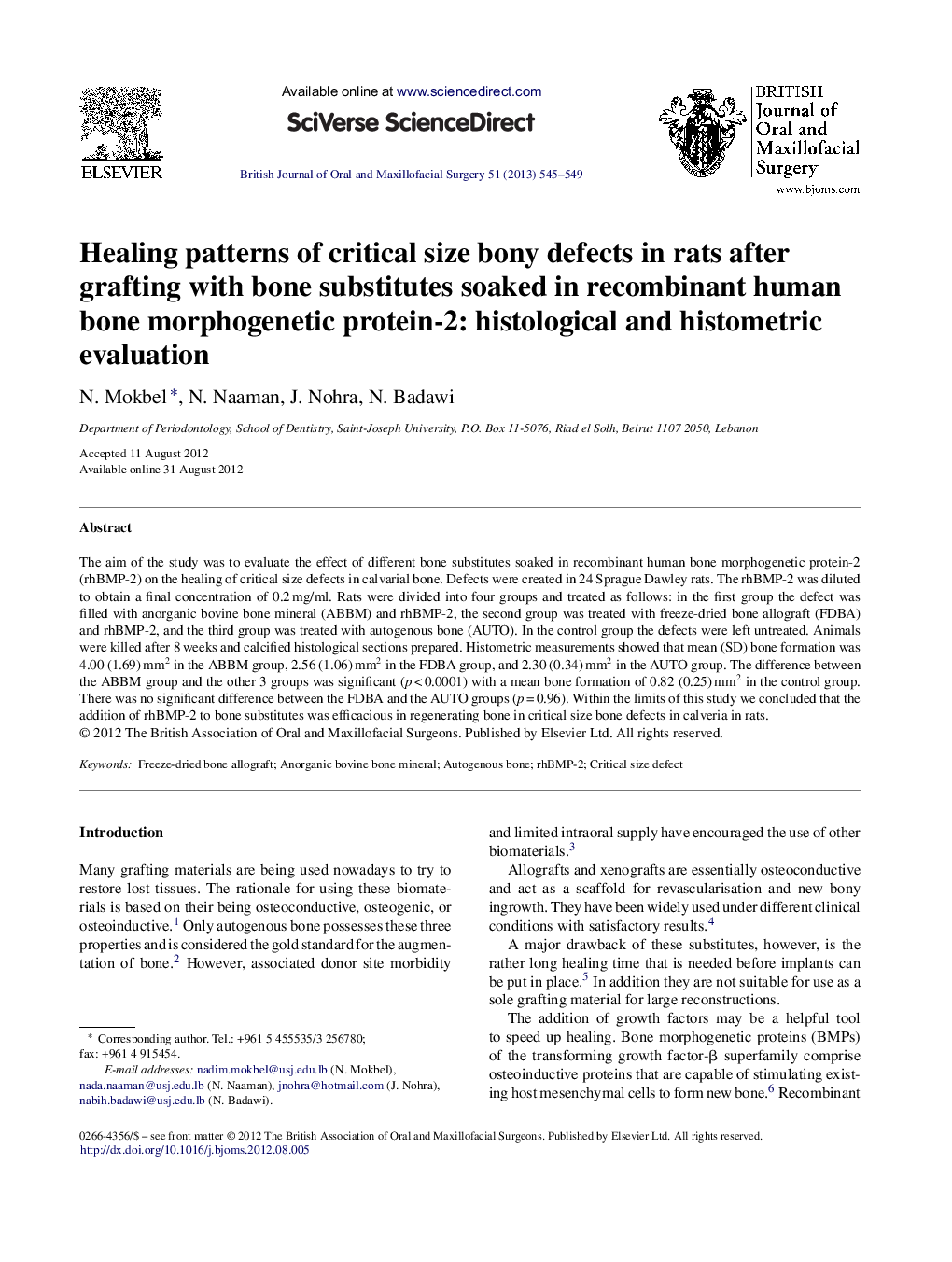 Healing patterns of critical size bony defects in rats after grafting with bone substitutes soaked in recombinant human bone morphogenetic protein-2: histological and histometric evaluation