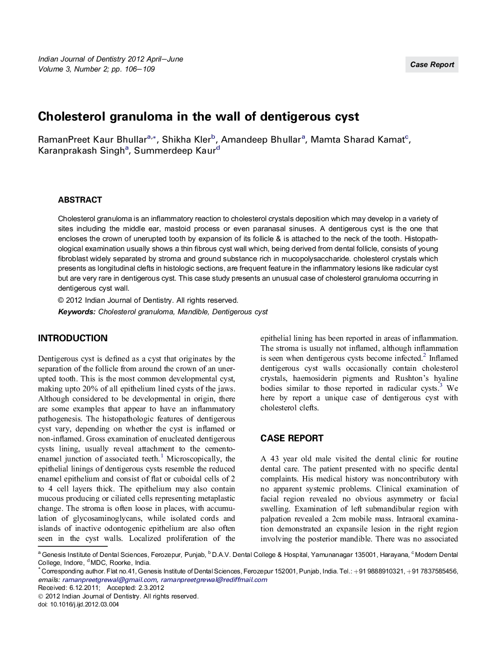 Cholesterol granuloma in the wall of dentigerous cyst