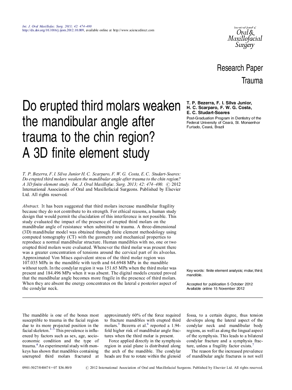 Do erupted third molars weaken the mandibular angle after trauma to the chin region? A 3D finite element study