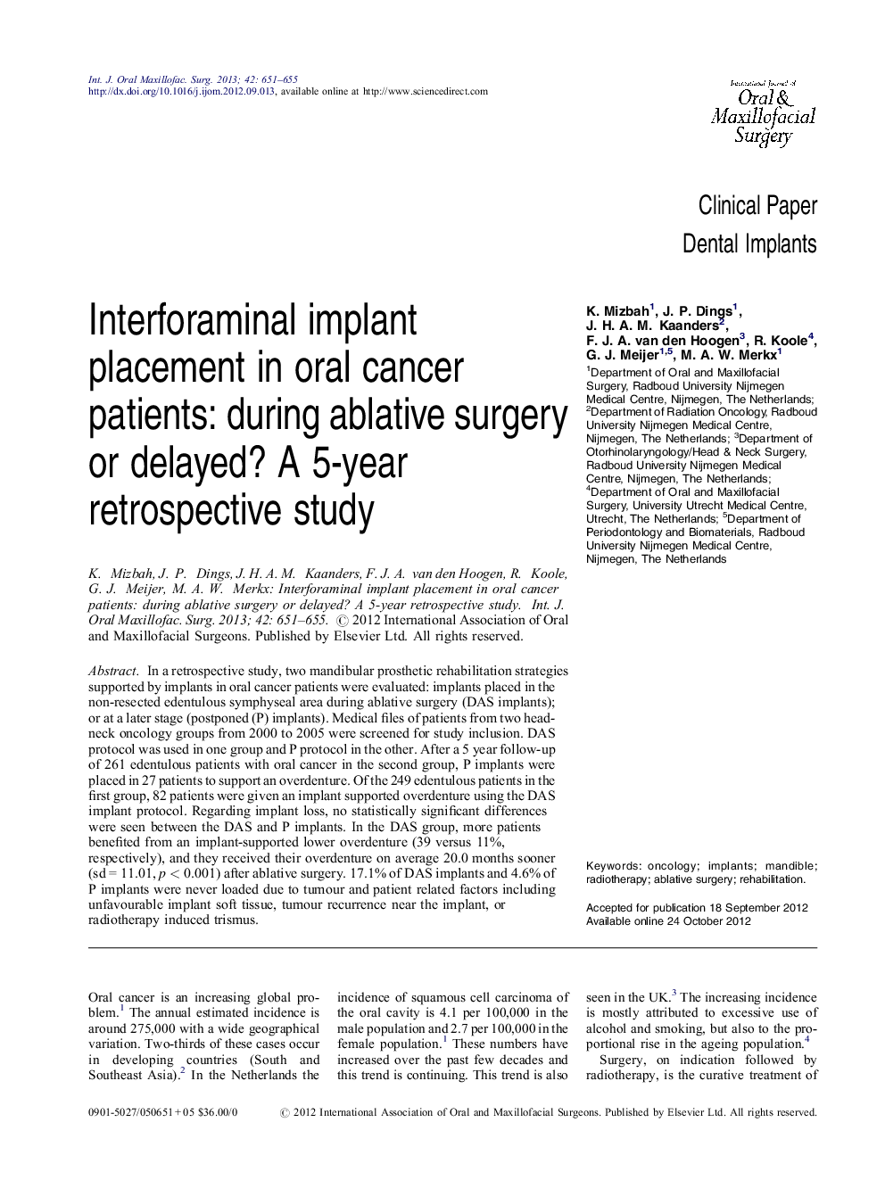 Interforaminal implant placement in oral cancer patients: during ablative surgery or delayed? A 5-year retrospective study