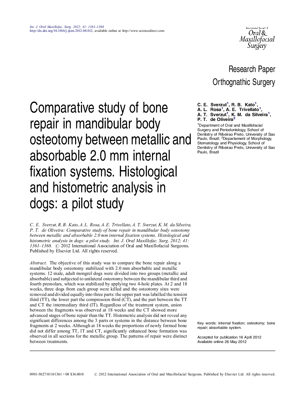 Comparative study of bone repair in mandibular body osteotomy between metallic and absorbable 2.0 mm internal fixation systems. Histological and histometric analysis in dogs: a pilot study