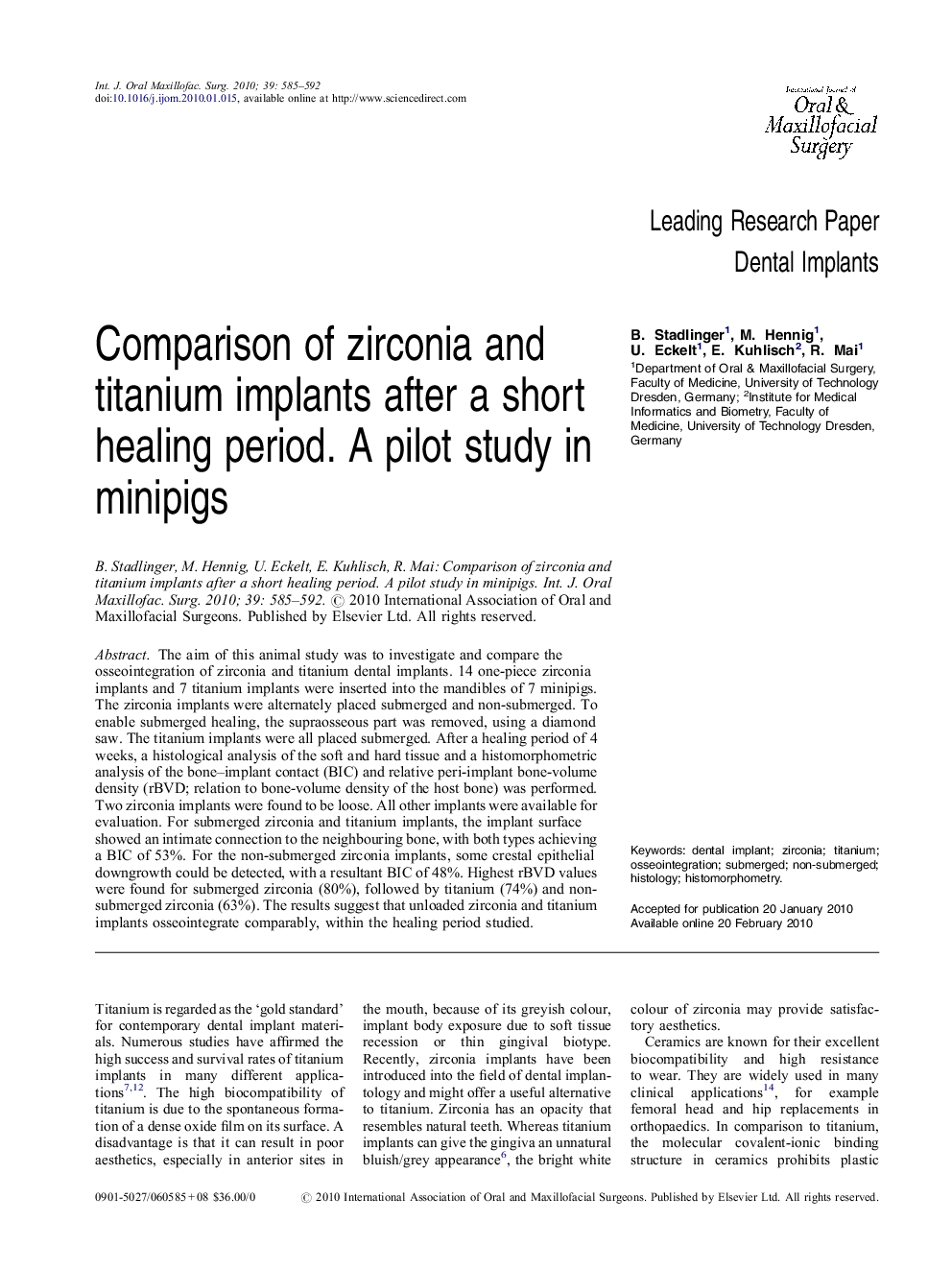 Comparison of zirconia and titanium implants after a short healing period. A pilot study in minipigs