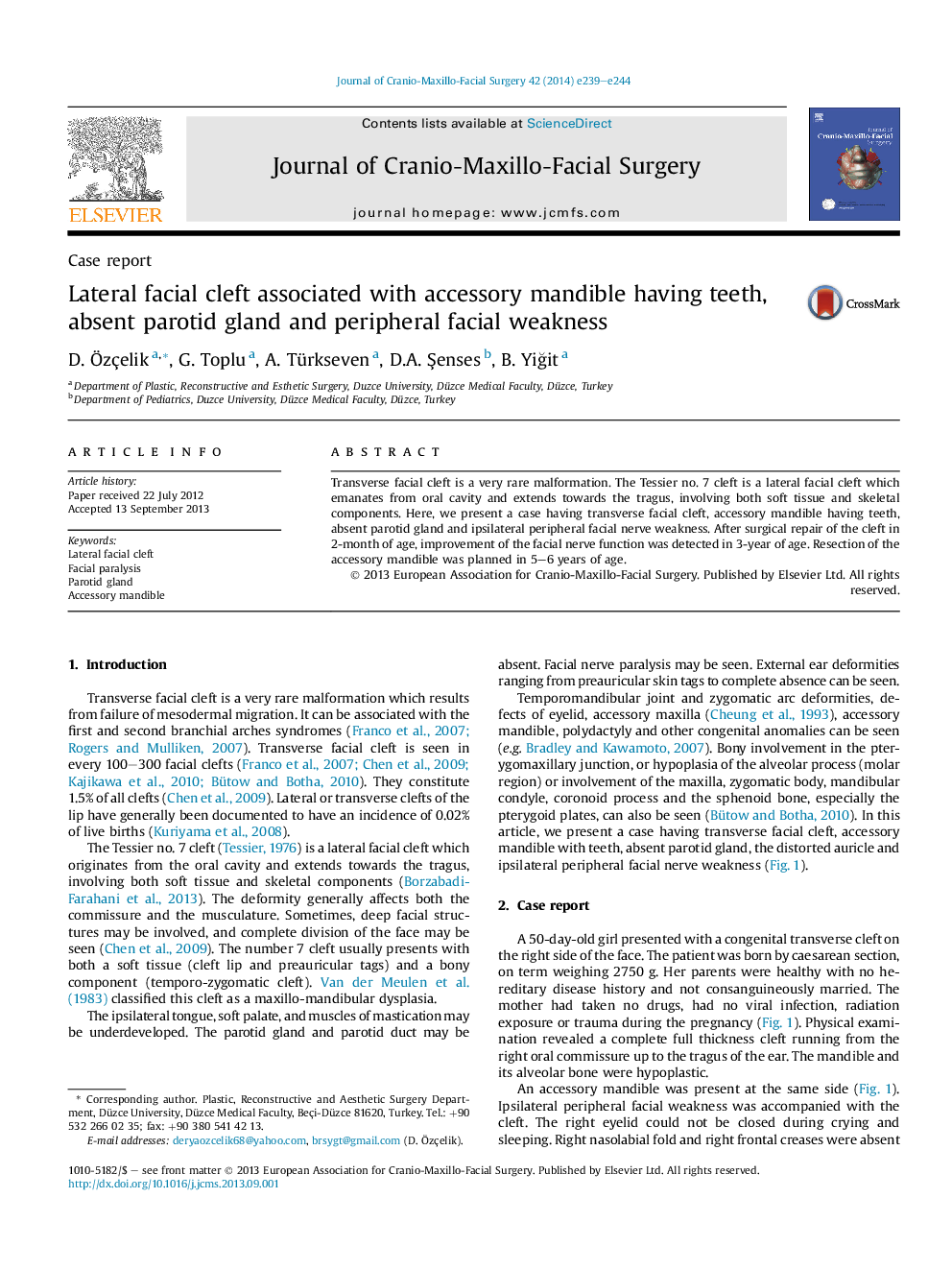 Lateral facial cleft associated with accessory mandible having teeth, absent parotid gland and peripheral facial weakness