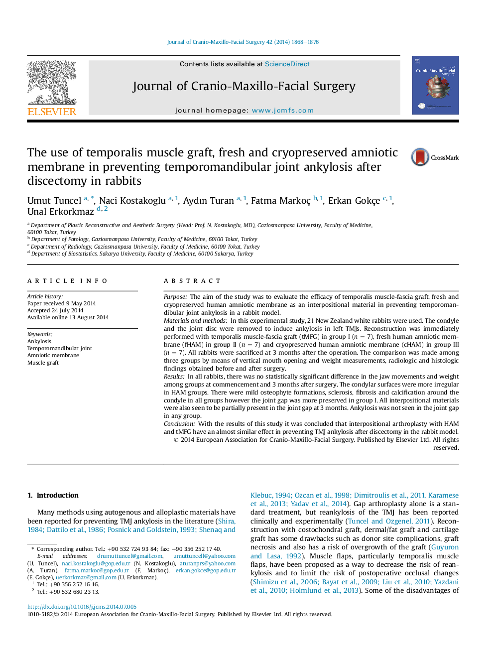 The use of temporalis muscle graft, fresh and cryopreserved amniotic membrane in preventing temporomandibular joint ankylosis after discectomy in rabbits