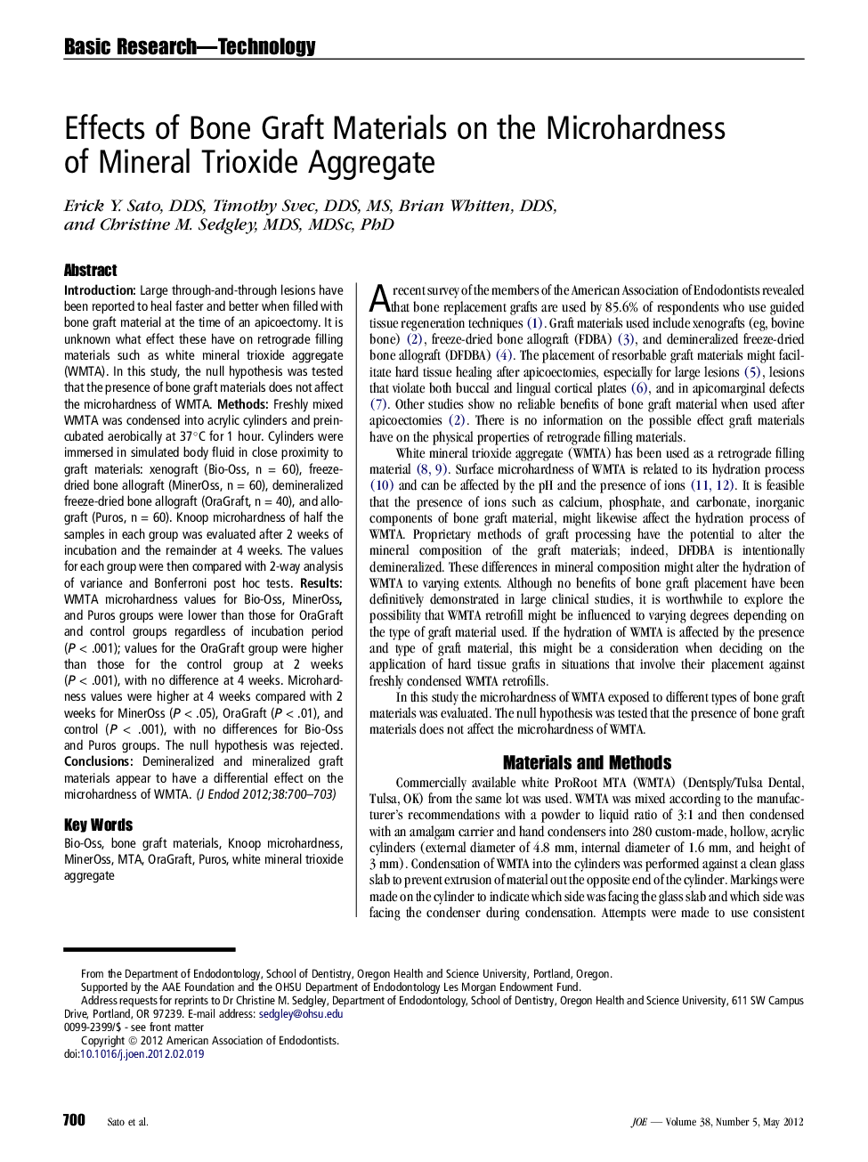 Effects of Bone Graft Materials on the Microhardness of Mineral Trioxide Aggregate 