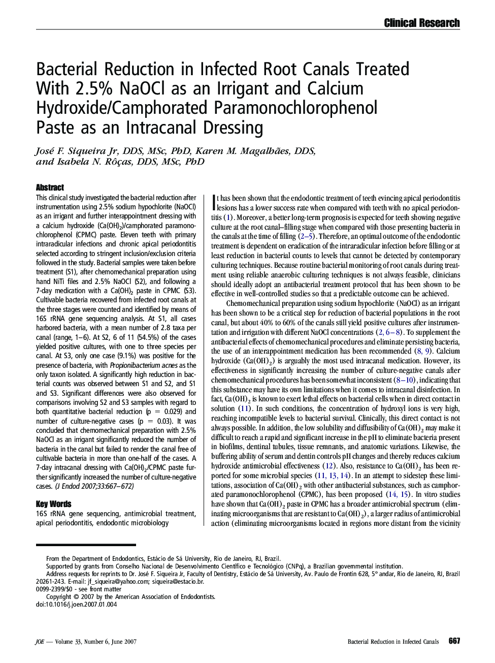 Bacterial Reduction in Infected Root Canals Treated With 2.5% NaOCl as an Irrigant and Calcium Hydroxide/Camphorated Paramonochlorophenol Paste as an Intracanal Dressing 