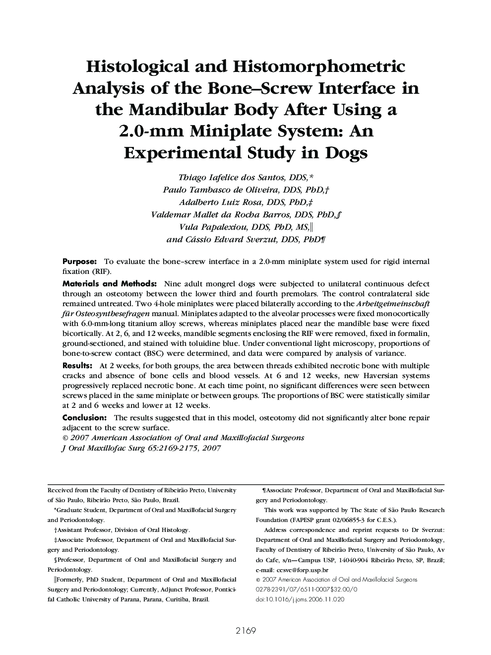 Histological and Histomorphometric Analysis of the Bone-Screw Interface in the Mandibular Body After Using a 2.0-mm Miniplate System: An Experimental Study in Dogs