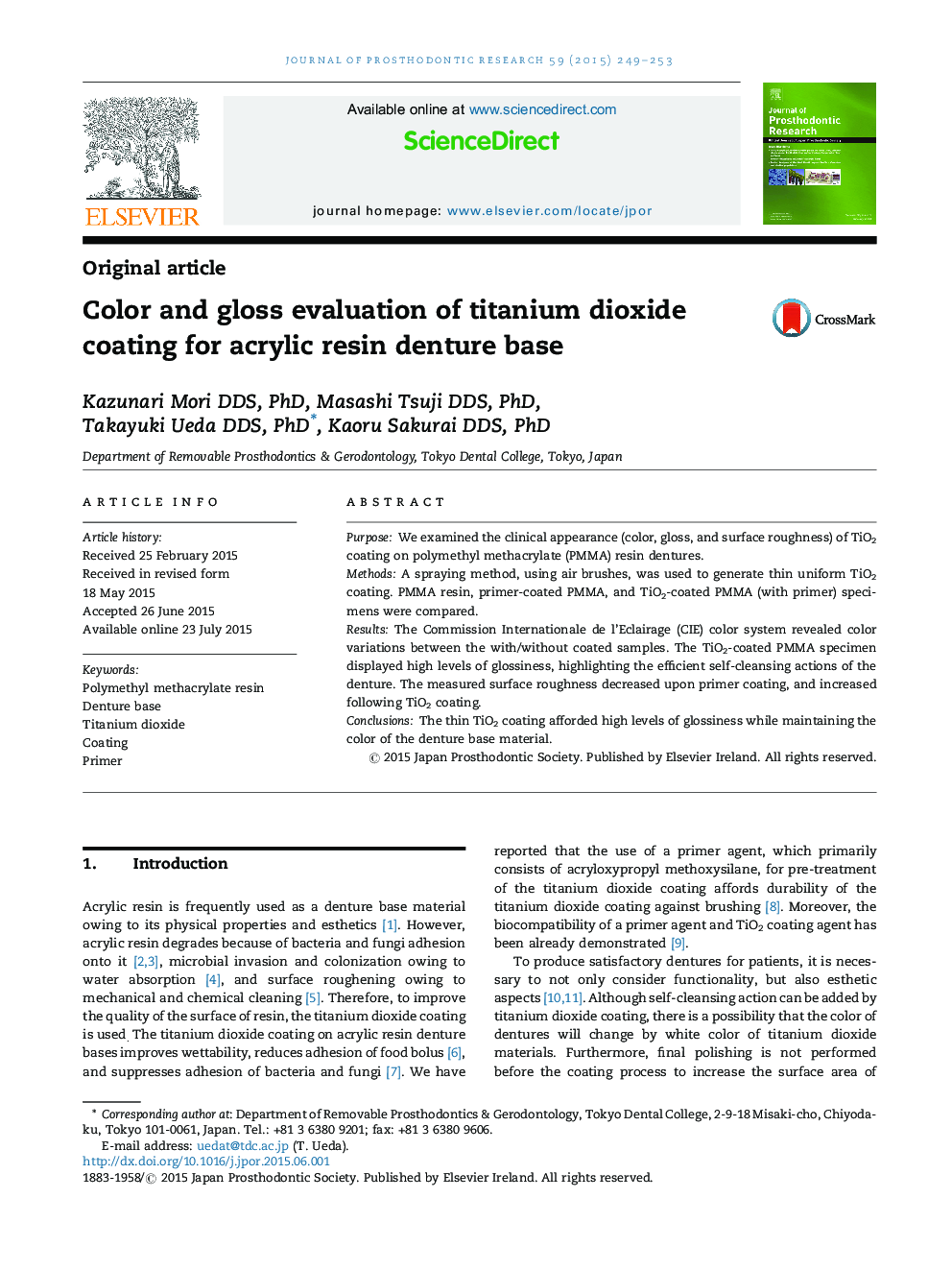 Color and gloss evaluation of titanium dioxide coating for acrylic resin denture base