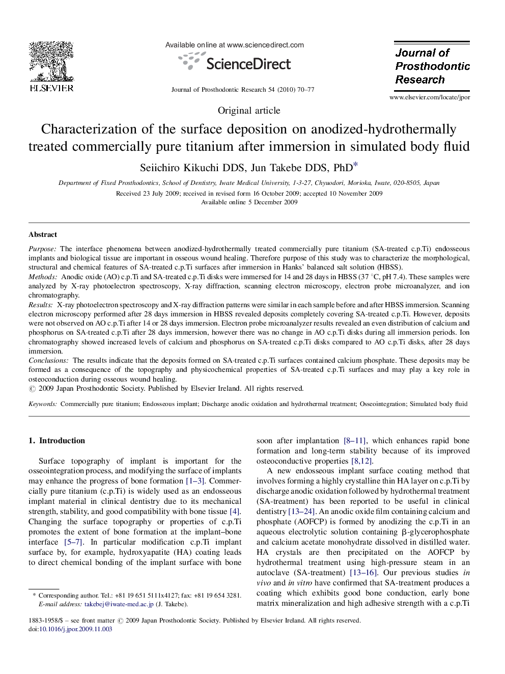 Characterization of the surface deposition on anodized-hydrothermally treated commercially pure titanium after immersion in simulated body fluid