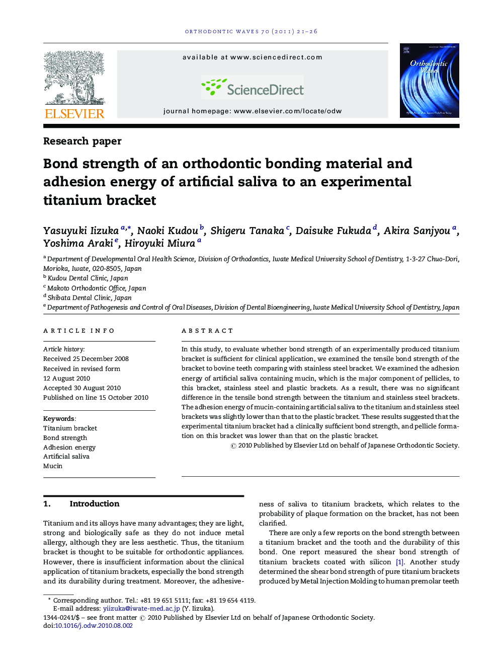 Bond strength of an orthodontic bonding material and adhesion energy of artificial saliva to an experimental titanium bracket