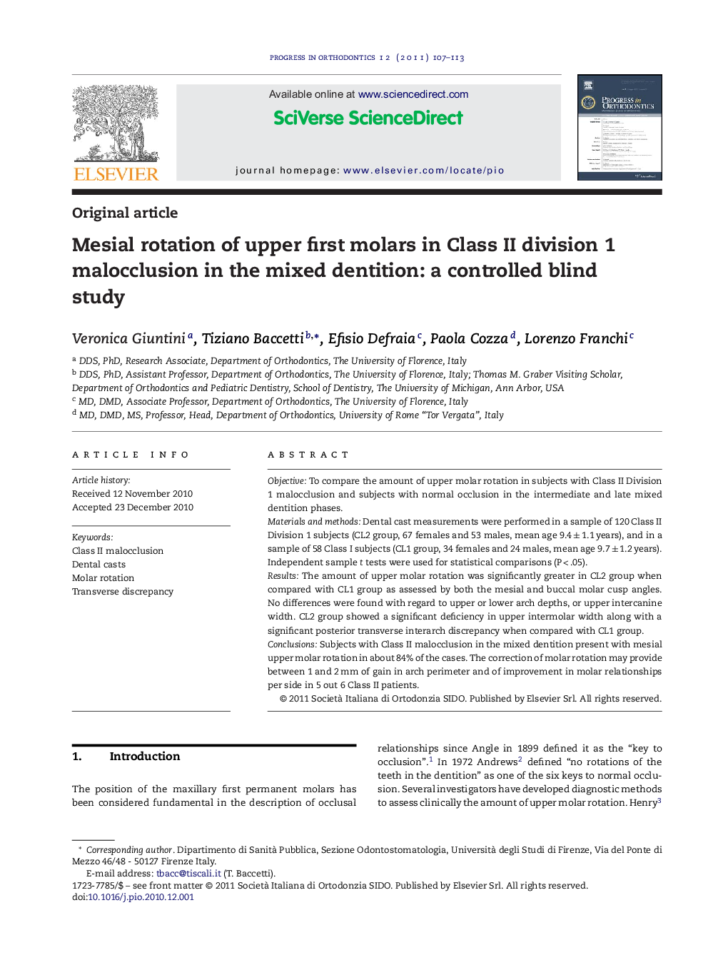 Mesial rotation of upper first molars in Class II division 1 malocclusion in the mixed dentition: a controlled blind study