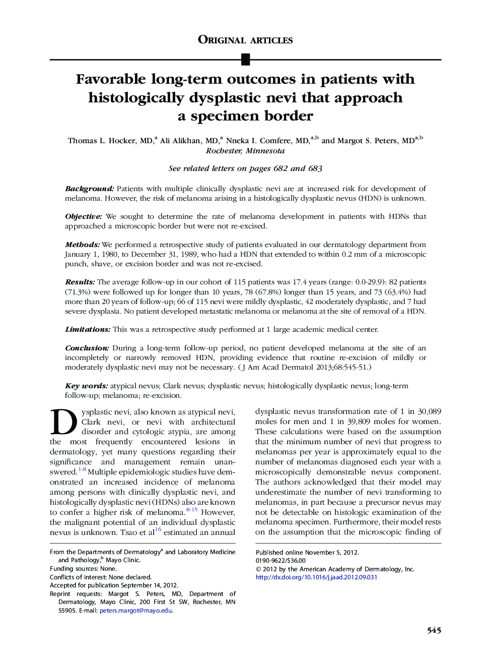 Favorable long-term outcomes in patients with histologically dysplastic nevi that approach a specimen border 