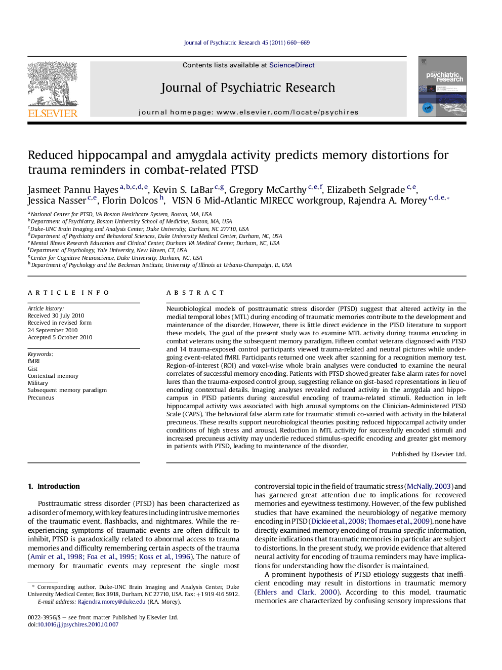 Reduced hippocampal and amygdala activity predicts memory distortions for trauma reminders in combat-related PTSD