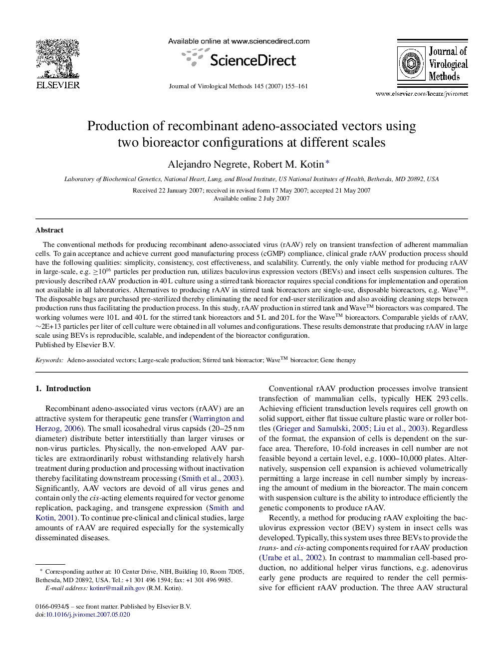 Production of recombinant adeno-associated vectors using two bioreactor configurations at different scales