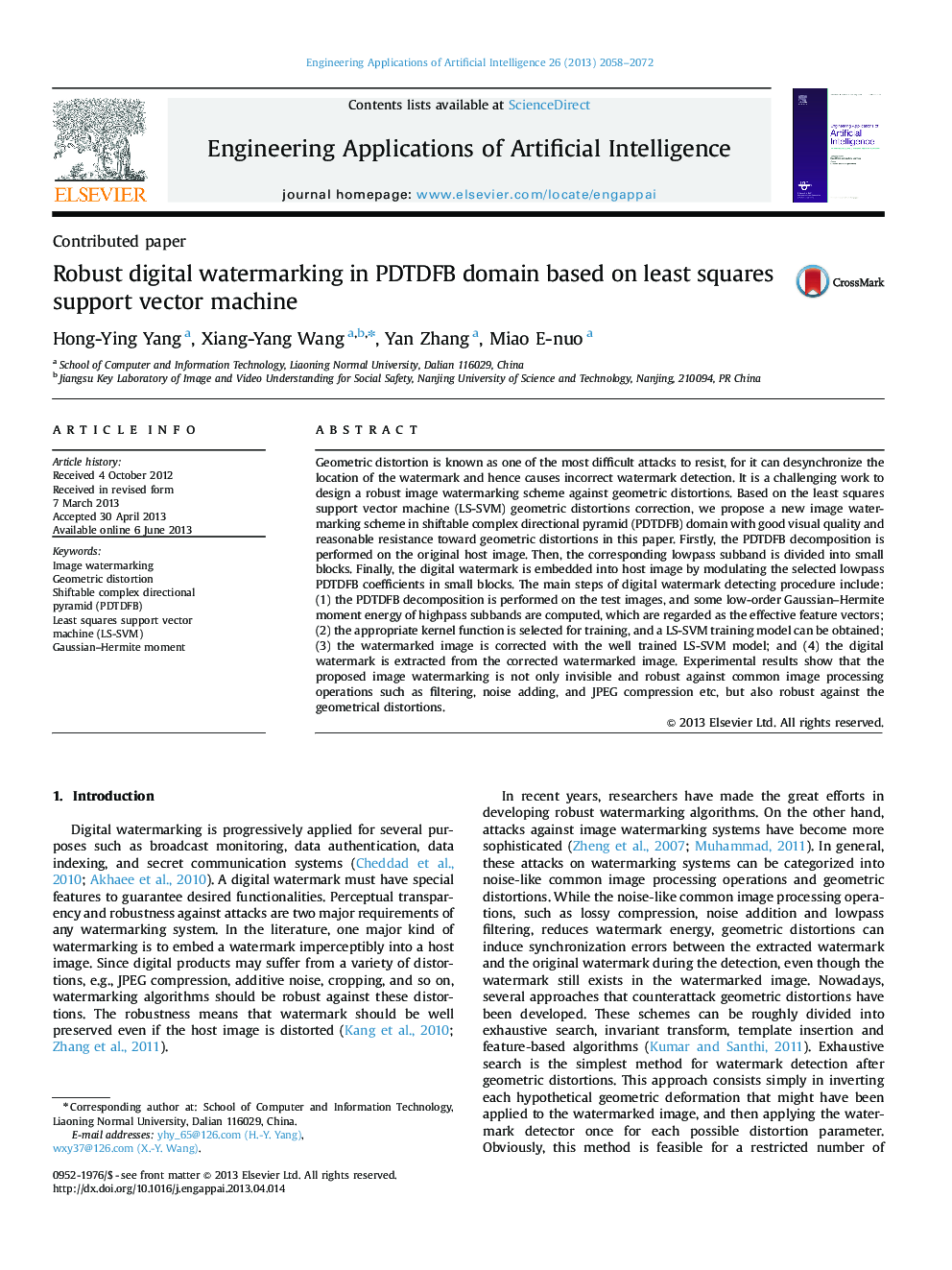 Robust digital watermarking in PDTDFB domain based on least squares support vector machine