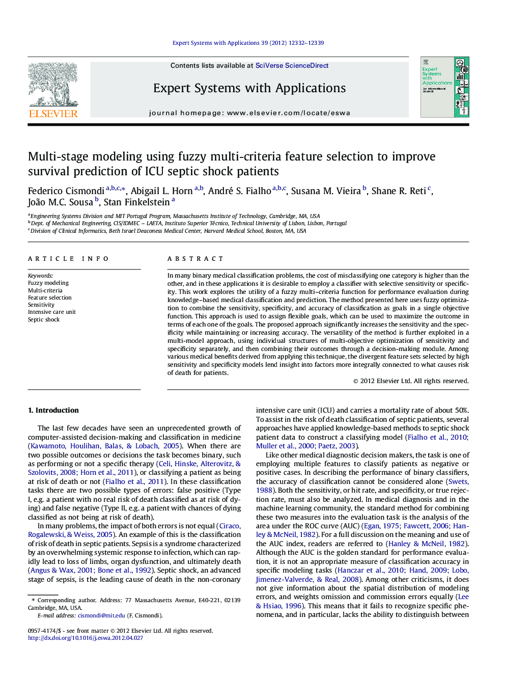 Multi-stage modeling using fuzzy multi-criteria feature selection to improve survival prediction of ICU septic shock patients