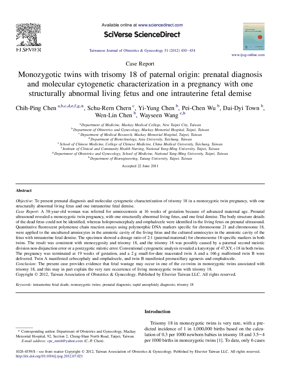 Monozygotic twins with trisomy 18 of paternal origin: prenatal diagnosis and molecular cytogenetic characterization in a pregnancy with one structurally abnormal living fetus and one intrauterine fetal demise