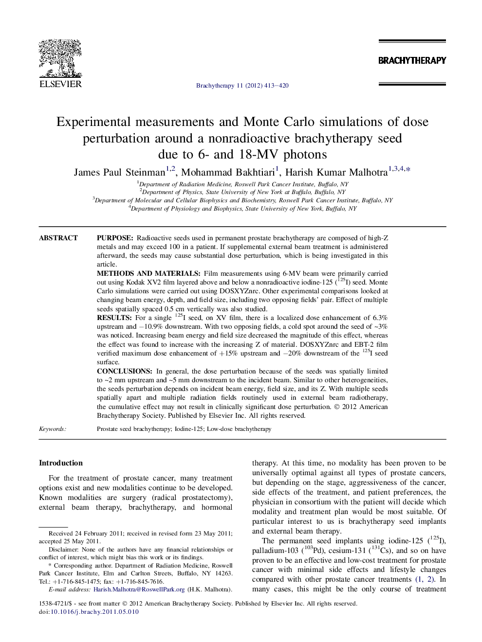 Experimental measurements and Monte Carlo simulations of dose perturbation around a nonradioactive brachytherapy seed due to 6- and 18-MV photons