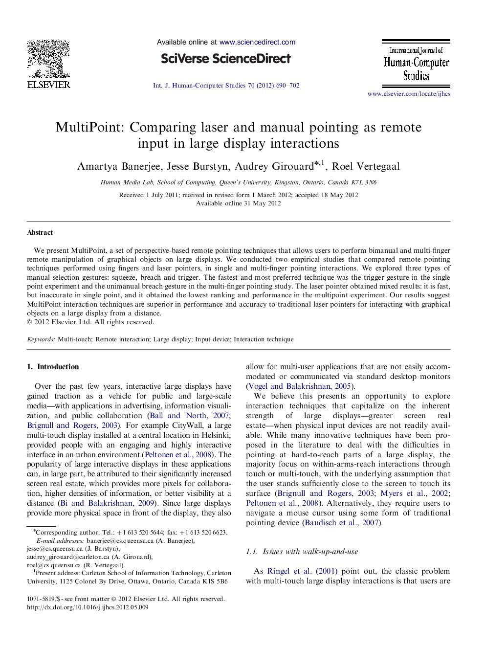 MultiPoint: Comparing laser and manual pointing as remote input in large display interactions