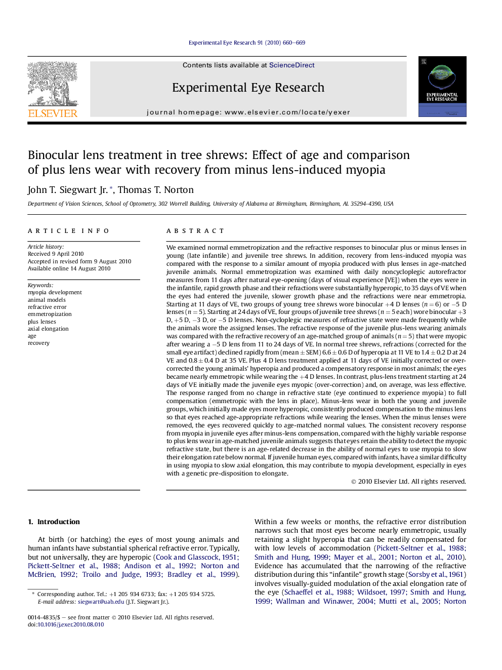 Binocular lens treatment in tree shrews: Effect of age and comparison of plus lens wear with recovery from minus lens-induced myopia