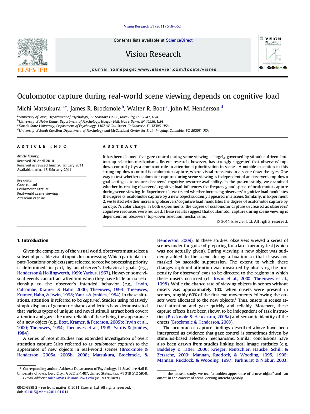 Oculomotor capture during real-world scene viewing depends on cognitive load