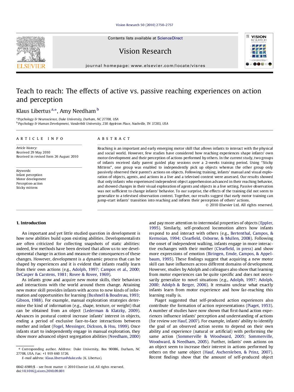 Teach to reach: The effects of active vs. passive reaching experiences on action and perception