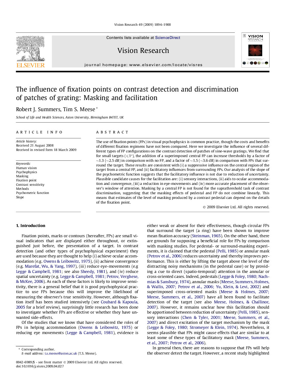 The influence of fixation points on contrast detection and discrimination of patches of grating: Masking and facilitation