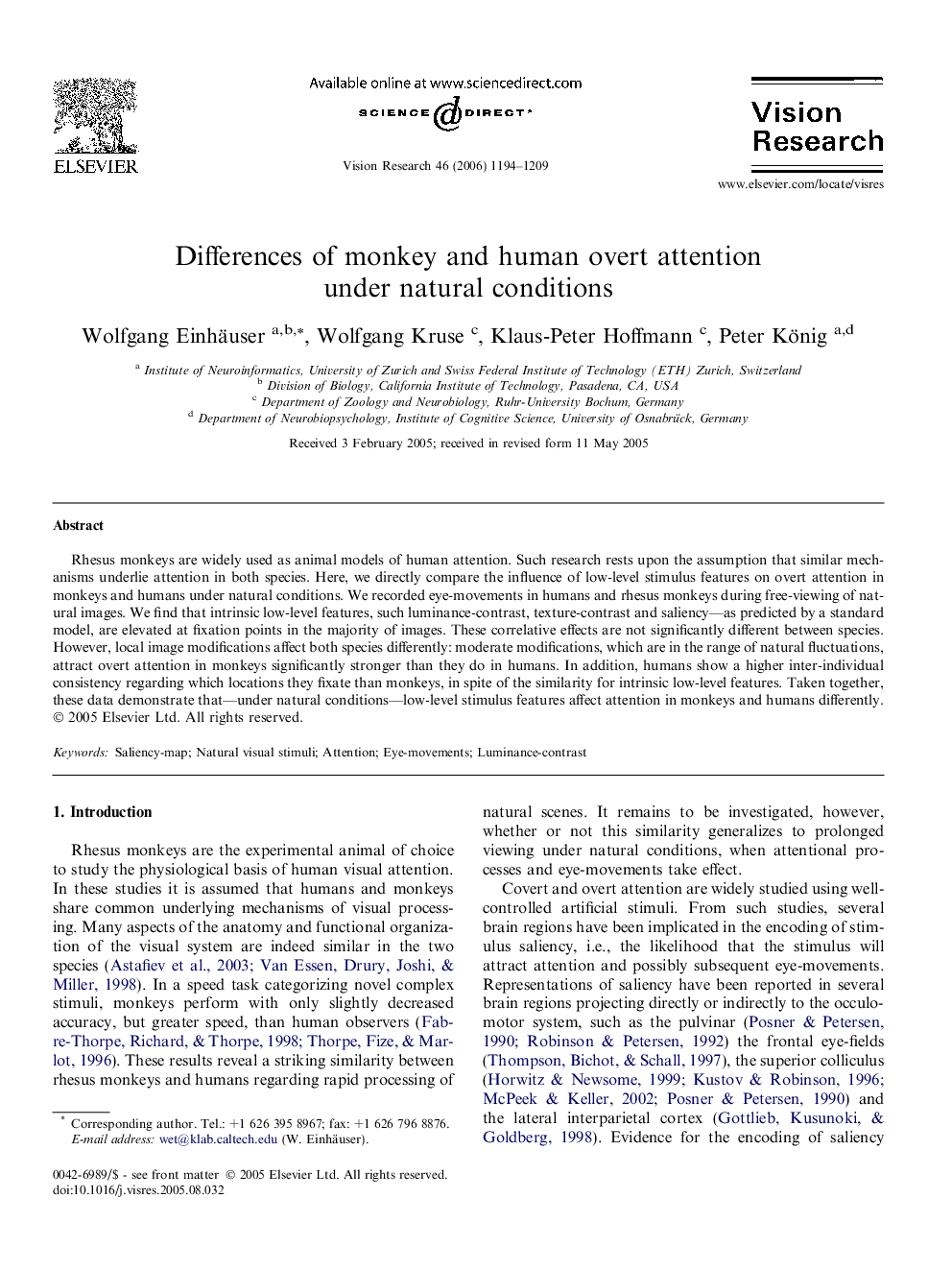 Differences of monkey and human overt attention under natural conditions