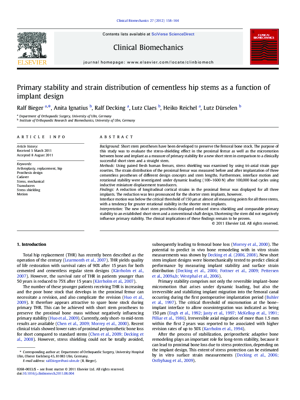 Primary stability and strain distribution of cementless hip stems as a function of implant design