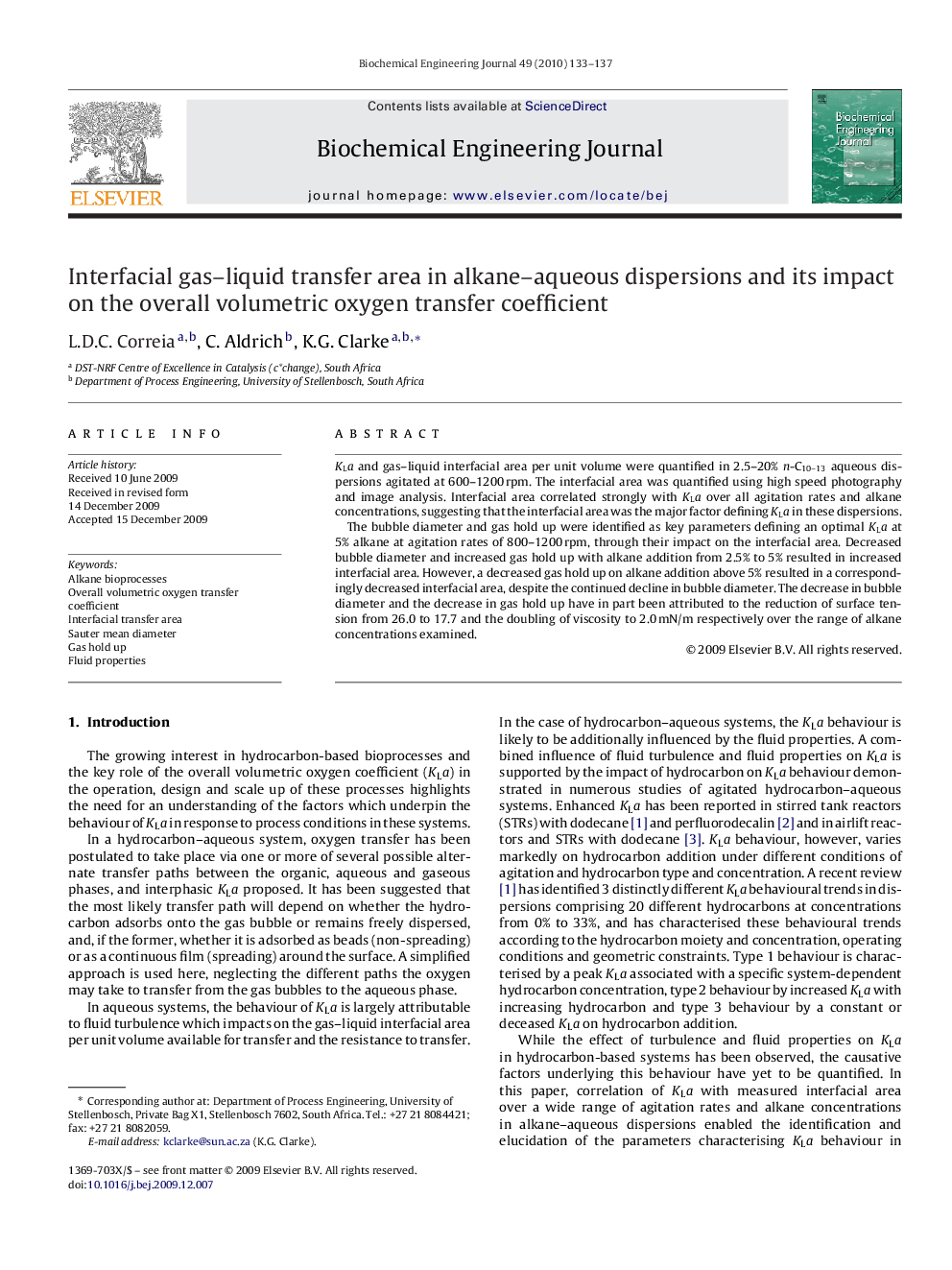 Interfacial gas–liquid transfer area in alkane–aqueous dispersions and its impact on the overall volumetric oxygen transfer coefficient