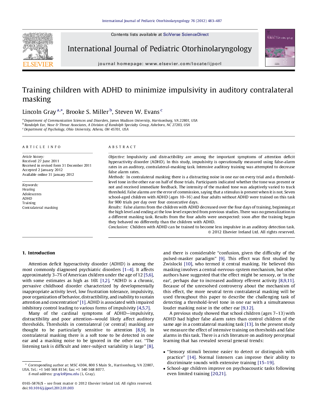 Training children with ADHD to minimize impulsivity in auditory contralateral masking