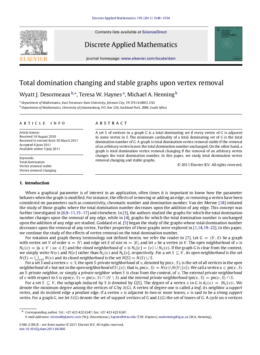 Total domination changing and stable graphs upon vertex removal