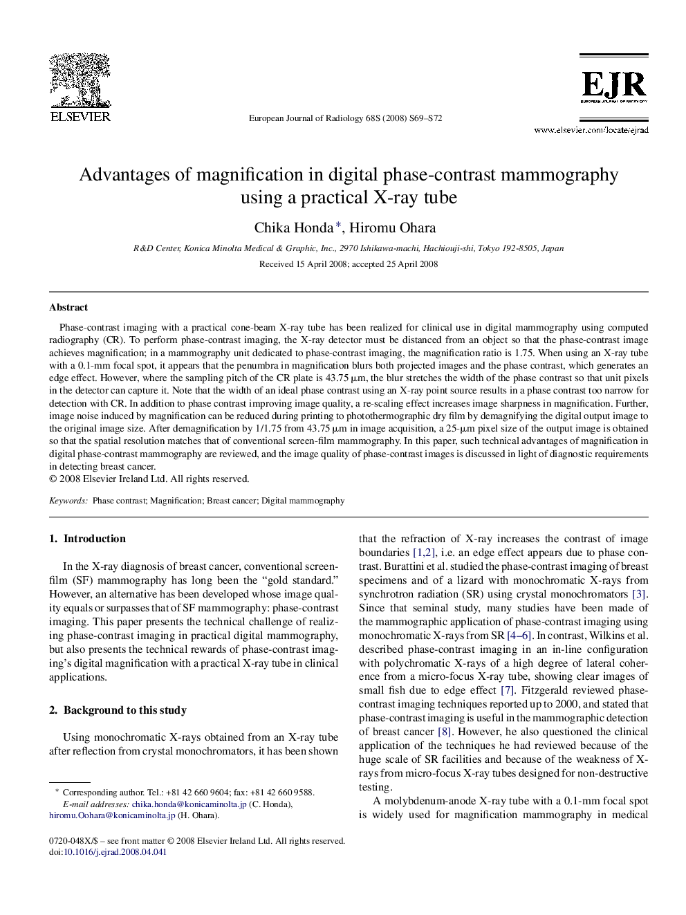 Advantages of magnification in digital phase-contrast mammography using a practical X-ray tube