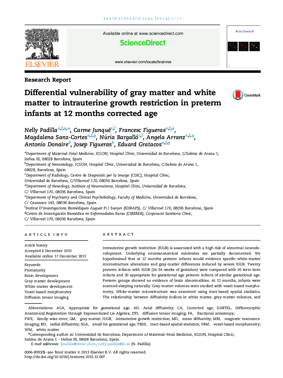 Differential vulnerability of gray matter and white matter to intrauterine growth restriction in preterm infants at 12 months corrected age