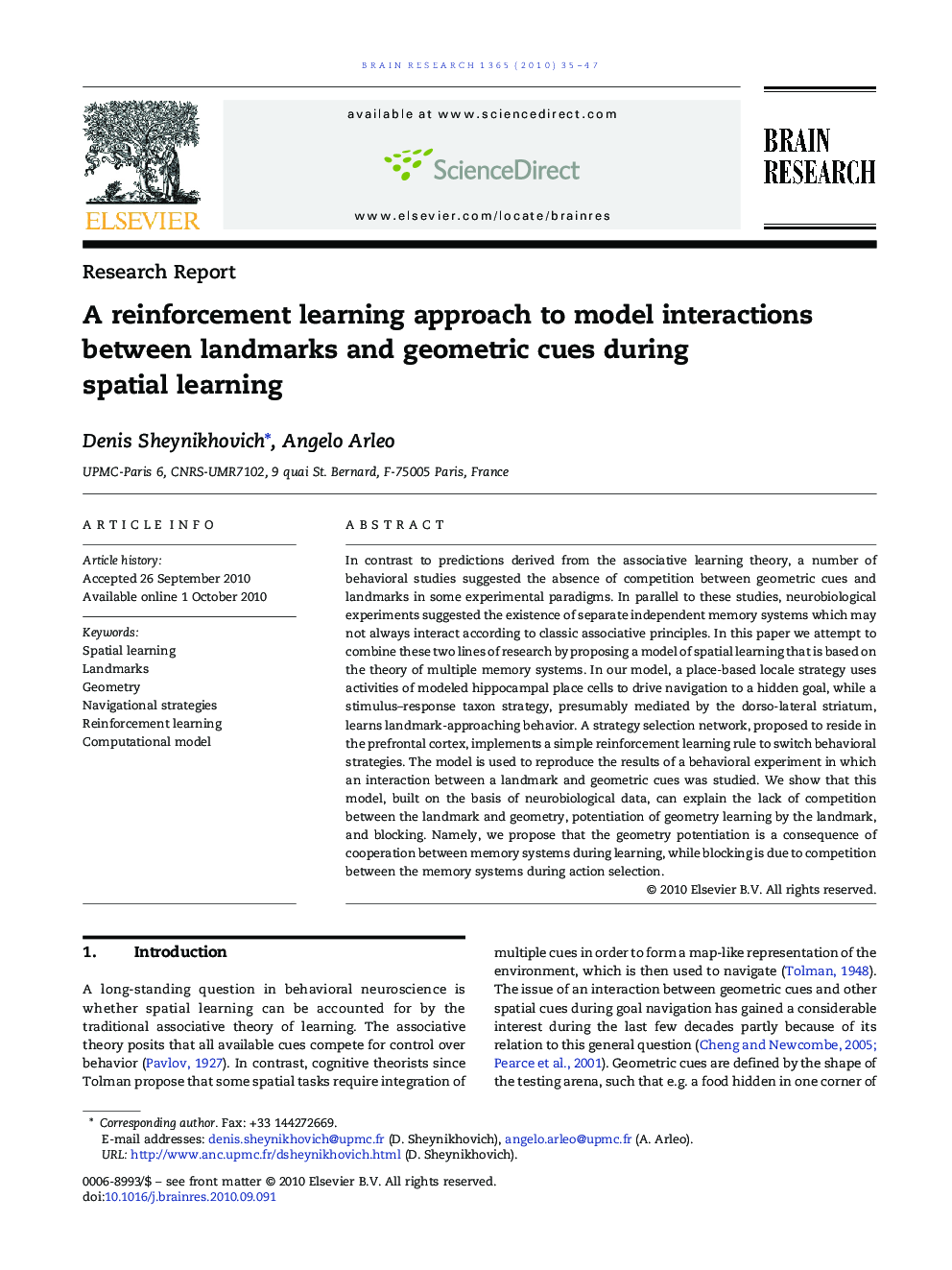 A reinforcement learning approach to model interactions between landmarks and geometric cues during spatial learning