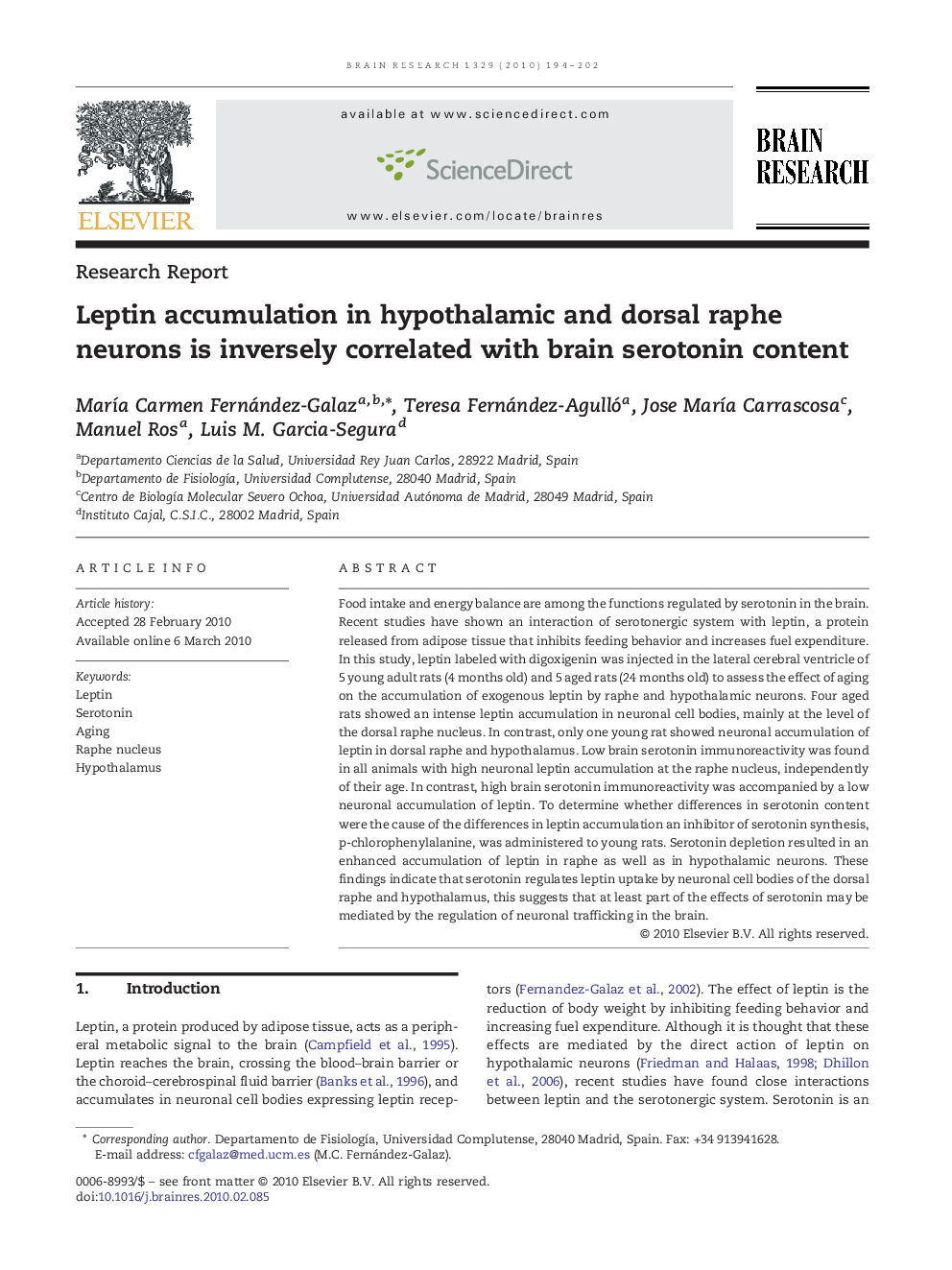 Leptin accumulation in hypothalamic and dorsal raphe neurons is inversely correlated with brain serotonin content