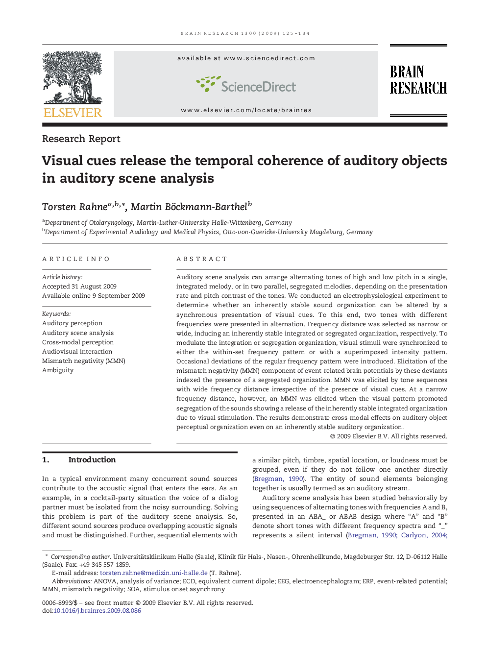 Visual cues release the temporal coherence of auditory objects in auditory scene analysis