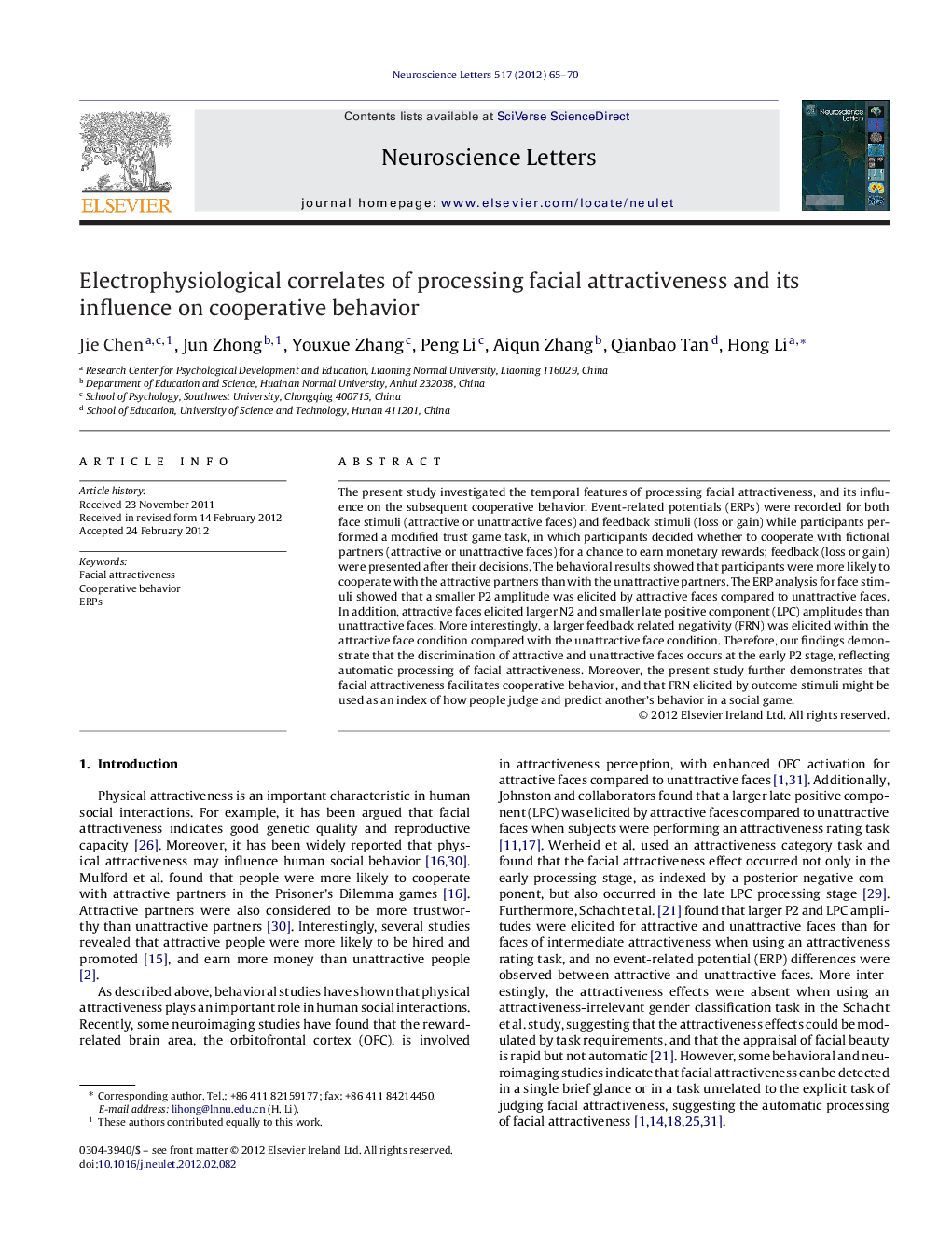 Electrophysiological correlates of processing facial attractiveness and its influence on cooperative behavior