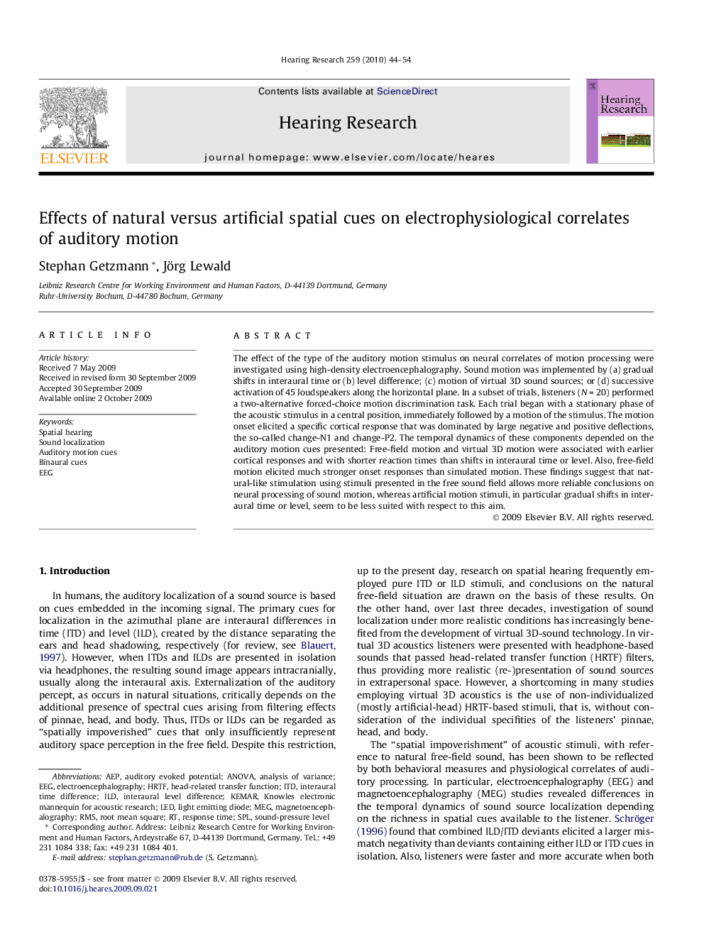 Effects of natural versus artificial spatial cues on electrophysiological correlates of auditory motion